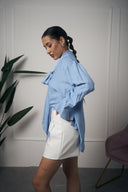 CAMICIA CON FIOCCO AZZURRA