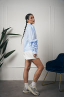 CAMICIA AZZURRA MANICA FIORE