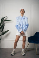 CAMICIA AZZURRA MANICA FIORE
