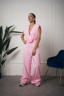 TUTA LUNGA CON FIORE ROSA