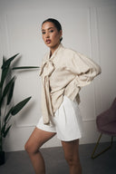 CAMICIA BEIGE FIOCCO