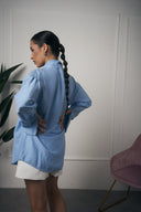 CAMICIA CON FIOCCO AZZURRA