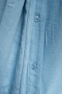 CAMICIA CON FIOCCO AZZURRA