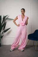 TUTA LUNGA CON FIORE ROSA