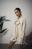CAMICIA BEIGE FIOCCO